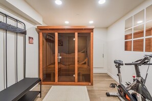Our private room features a sauna and a spin bike for your fitness and relaxation needs.