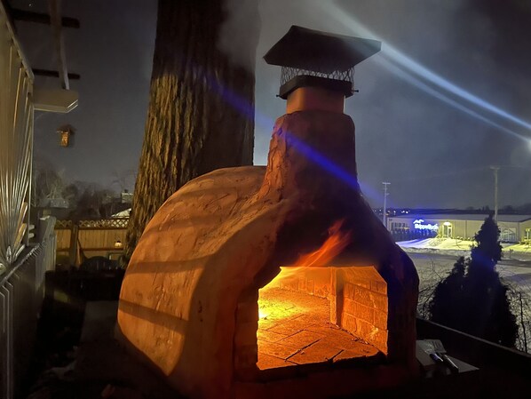 Wood fired pizza oven - cooks three 16 in pizzas at once! 