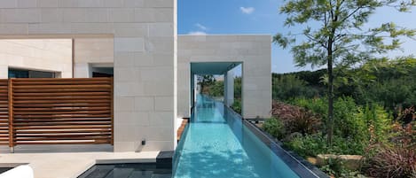 A stunning, private, 50-meter-long swimming pool that runs along the full length of the property!