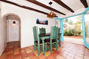 Inside dining area with French door access to garden/patio