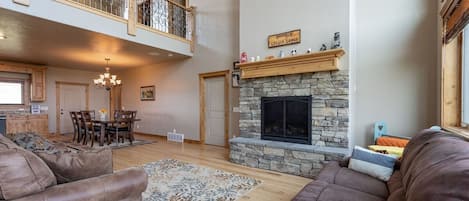 Get comfy on the main floor near the fireplace.