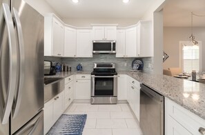 Your kitchen is fully equipped, including beer glasses in the freezer