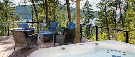 Enjoy the private hot tub and take in the Whitefish Lake views as you relax with your group.
