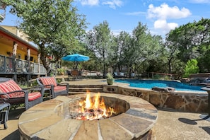 Enjoy company around the stone firepit