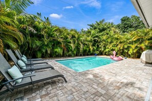 Enjoy the lounge chairs by the pool after a long day at the beach🏝