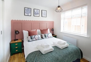 The double bedroom with built in wardrobes and linen and towels provided