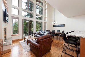 Main Living/Dining Space - TV, Gas Fireplace, Deck and Views