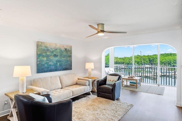 Gorgeous sun-filled living space with enclosed lanai (one of only three in Bayside Villas with this feature, providing guests an extra 200 square feet of living space)
