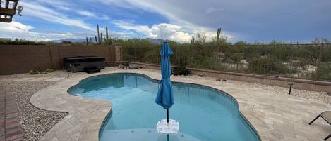 Heated Salt Water Pool with in-pool umbrella.
