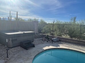 Hot tub and private back yard