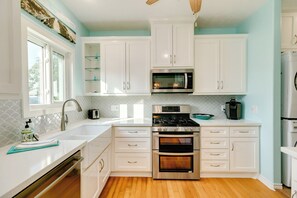 beautiful kitchen that is sparkling clean