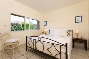 Relax on the luxurious Double bed after a day outside.