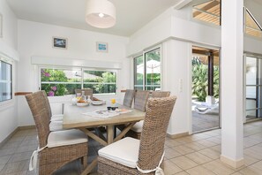 Reconnect with loved ones over a meal at the dining table.