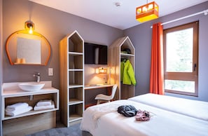 Relax on the comfy bed after a day outside.