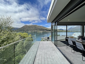 Large deck wih spectacular view of Lake Wakatipu and The Remarkables 