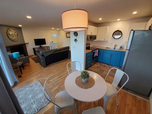 Enjoy meals or relax on the comfortable living room.