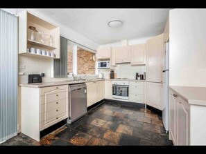 Fully equipped kitchen with full size refridgerator and idshwasher