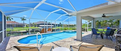 Pool with sun loungers