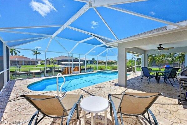 Pool with sun loungers