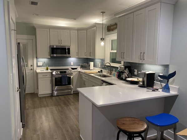 New kitchen fully stocked. 