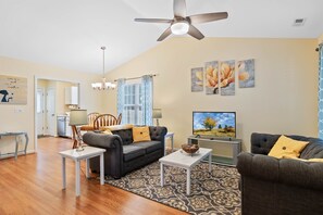 Relax in the living room with the Smart TV where you can log into your streaming accounts.