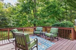 Unwind at the end of the day on the porch just off the kitchen.
