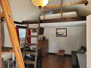 Soltow Cabin living area and double bed loft