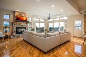Moving picture, panoramic lake views are on feature throughout the house. 