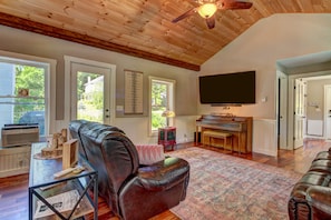 Family room on the main level. Smart TV