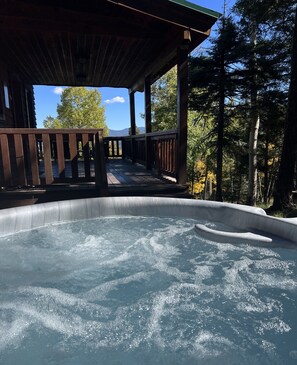 Relax in our 6 person hot tub under the stars!