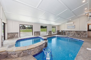 Refreshing, Indoor heated pool with a relaxing spa.
