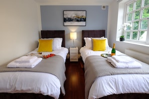 Each bedroom has a Super King double bed which can also be configured on request as two single beds as shown here.