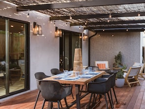 Intimate outdoor dining set beneath our pergola. 