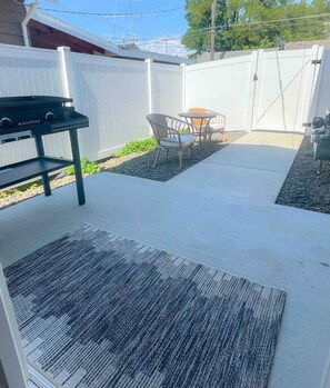 Private backyard with Blackstone and patio furniture