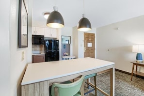 Share meals and laughs at the dining area.
