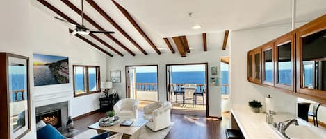 Spacious living room opens to 35-foot corner balcony and jaw-dropping views.