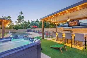 Enjoy fun outdoor games, an outdoor BBQ, covered ramada with TV, and more!