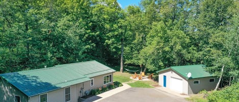 3BD | 2 BA wooded lot offers so much fun and a whimsical walkway to the dock