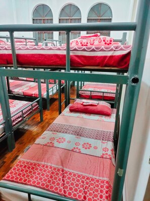 A bunkbed with beddings is provided
