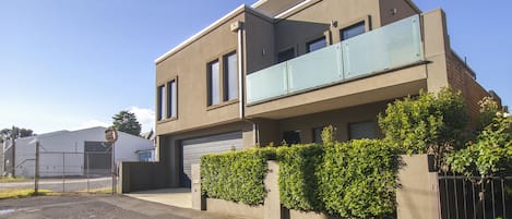 Street view of the 2-storey house. 