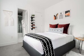 Bedroom 2 with full-size bed and full ensuite bathroom