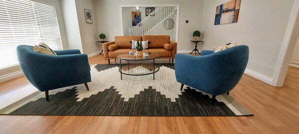 Gather with friends in our mid-century inspired living room