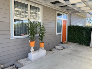 Private entrance and covered car port parking space 