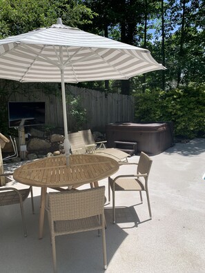 Sit out by pool and relax - sit, or use hub, and enjoy 50" outdoor tv.