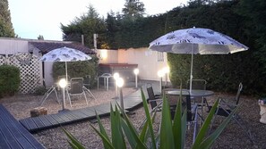 Courtyard Illuminated At Night With Low Voltage Lighting