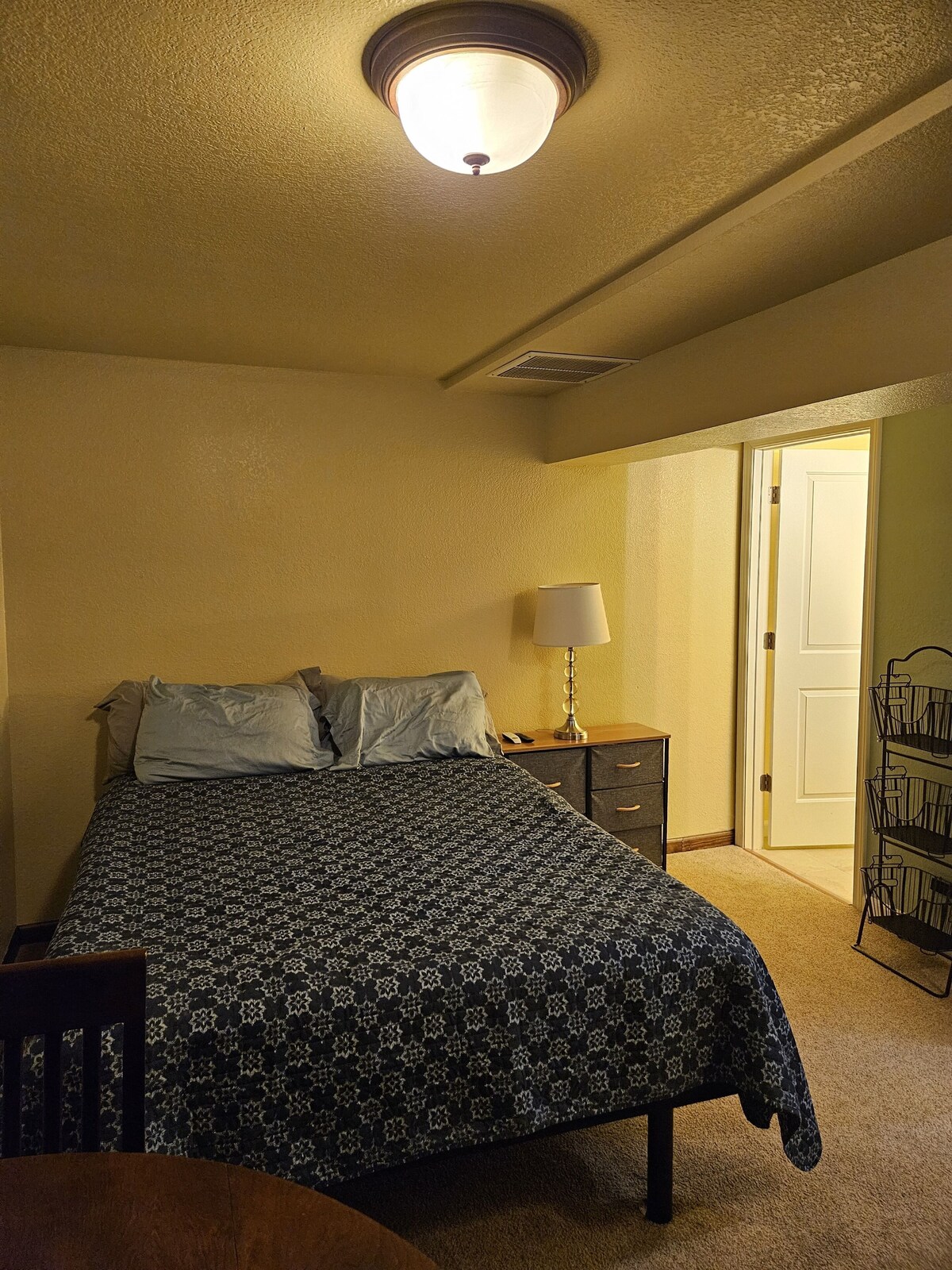 Bright and private basement studio with full laundry in rental.