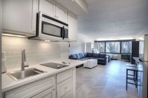 Kitchen with Fridge, Stovetop Burners, Microwave