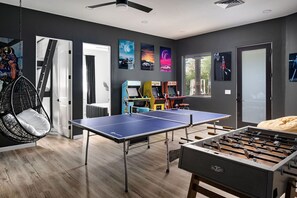 Entertainment room with Foosball, Ping Pong, and 3 Vintage Arcades