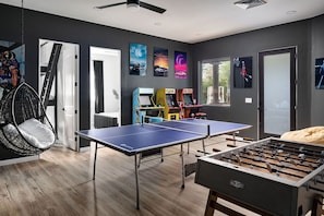 Entertainment room with Foosball, Ping Pong, and 3 Vintage Arcades