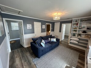 Game Room with 55" TV.  Board games and puzzles included.  Queen sofa sleeper.